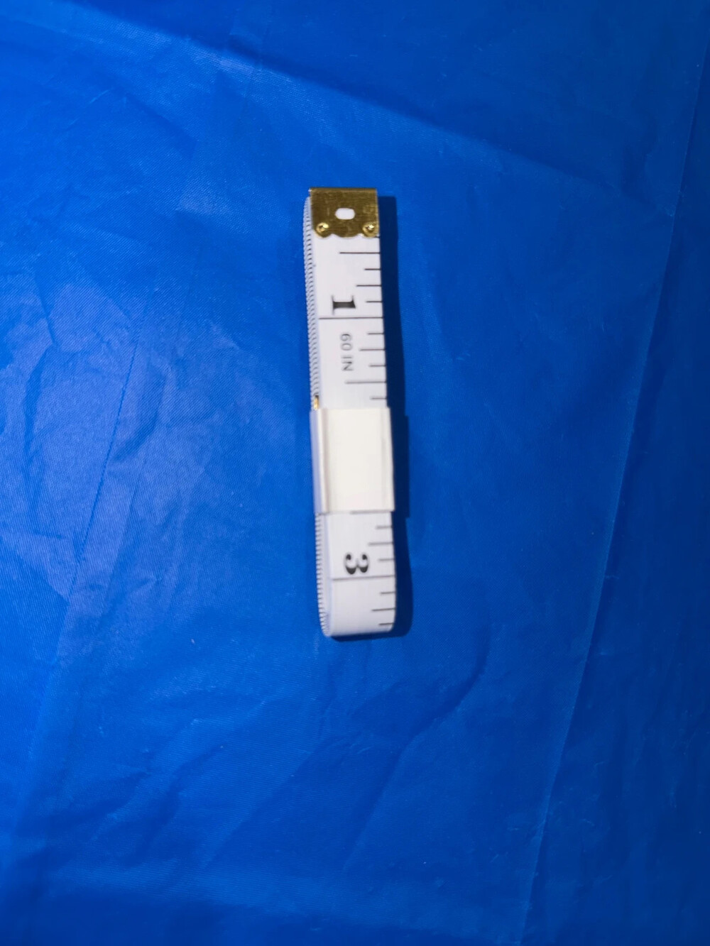 Flexible double sided tape measure
